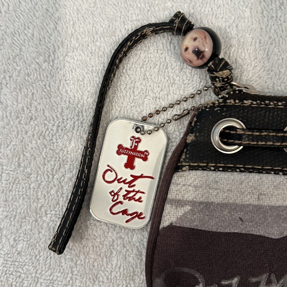 Fuzzy Nation “Out of the Cage” Yellow Lab Wristlet - Picture 3 of 7